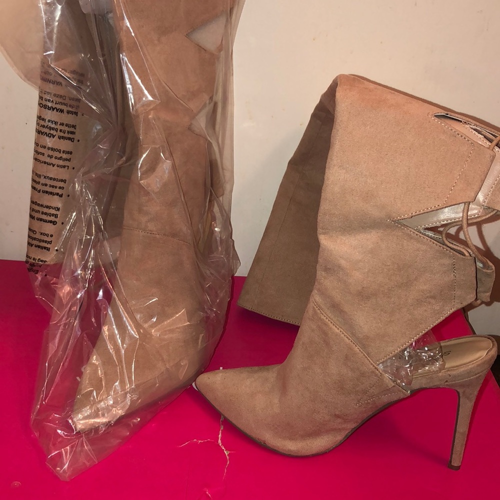 Heeled Thigh high lace up boot